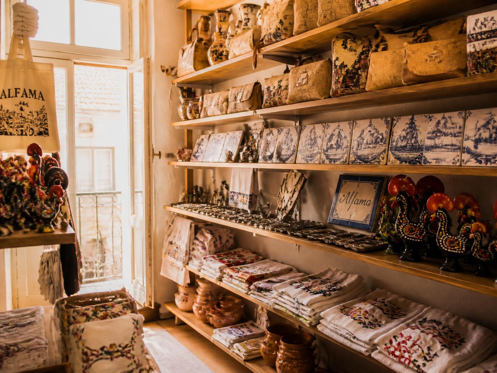Interior of Handicraft Souvenirs shop with shelves of Portuguese crafts